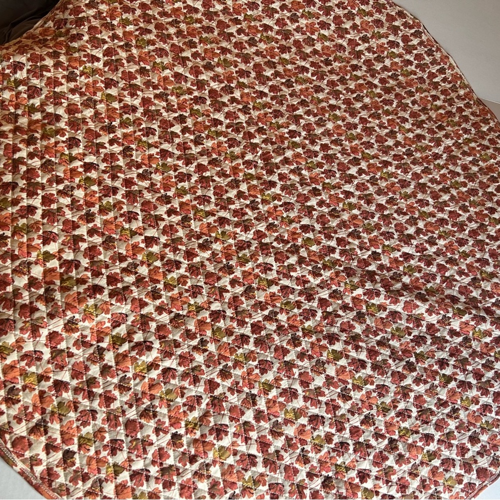 Kate Quinn round quilted play mat in autumn leaves